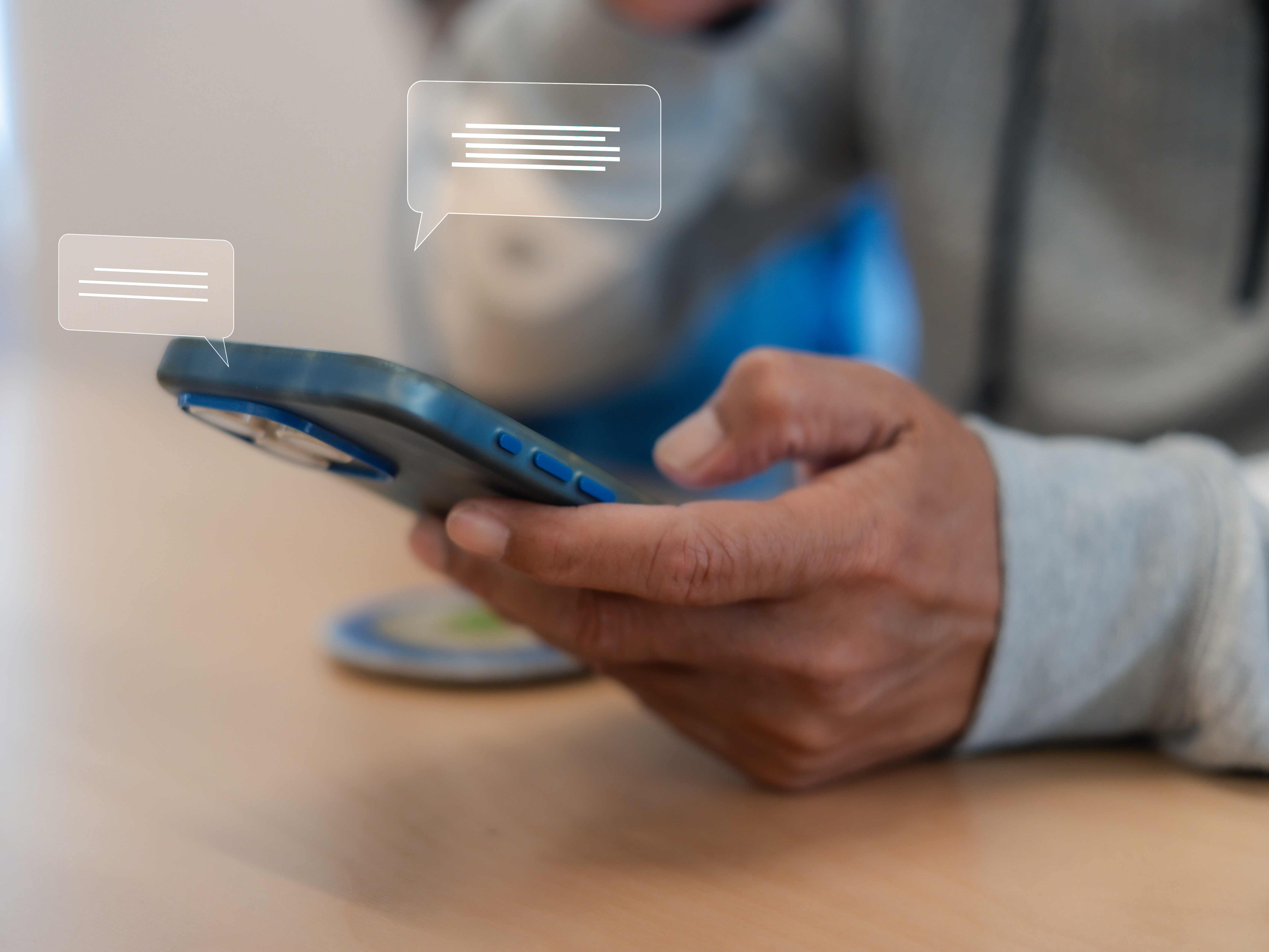 Close up man using smart phone, Social media marketing concept. hand using smartphone typing, chatting conversation in chat box icons pop up